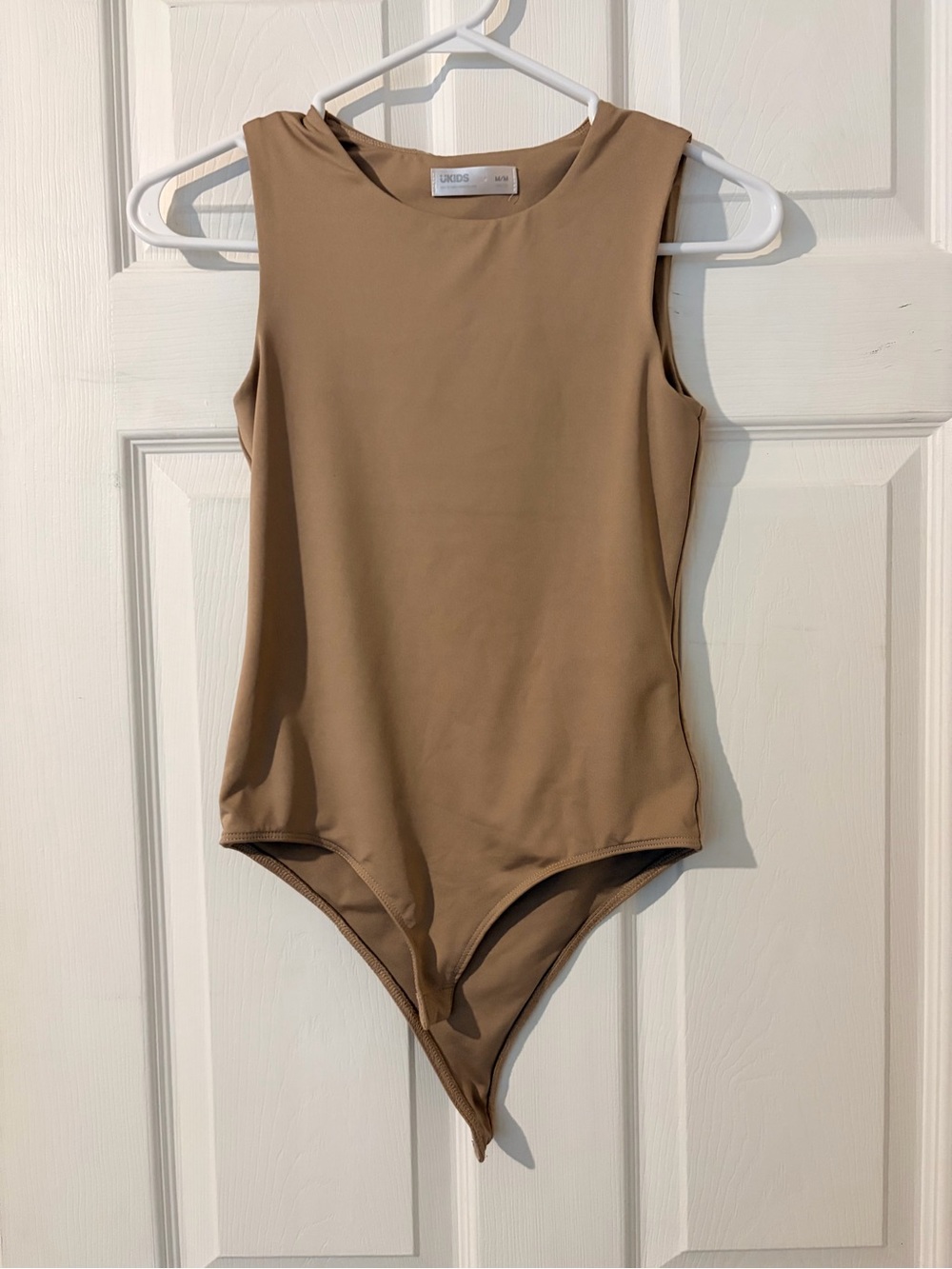 Kids Sleeveless One-Piece Bodysuit in Taupe - Minimal Stretch